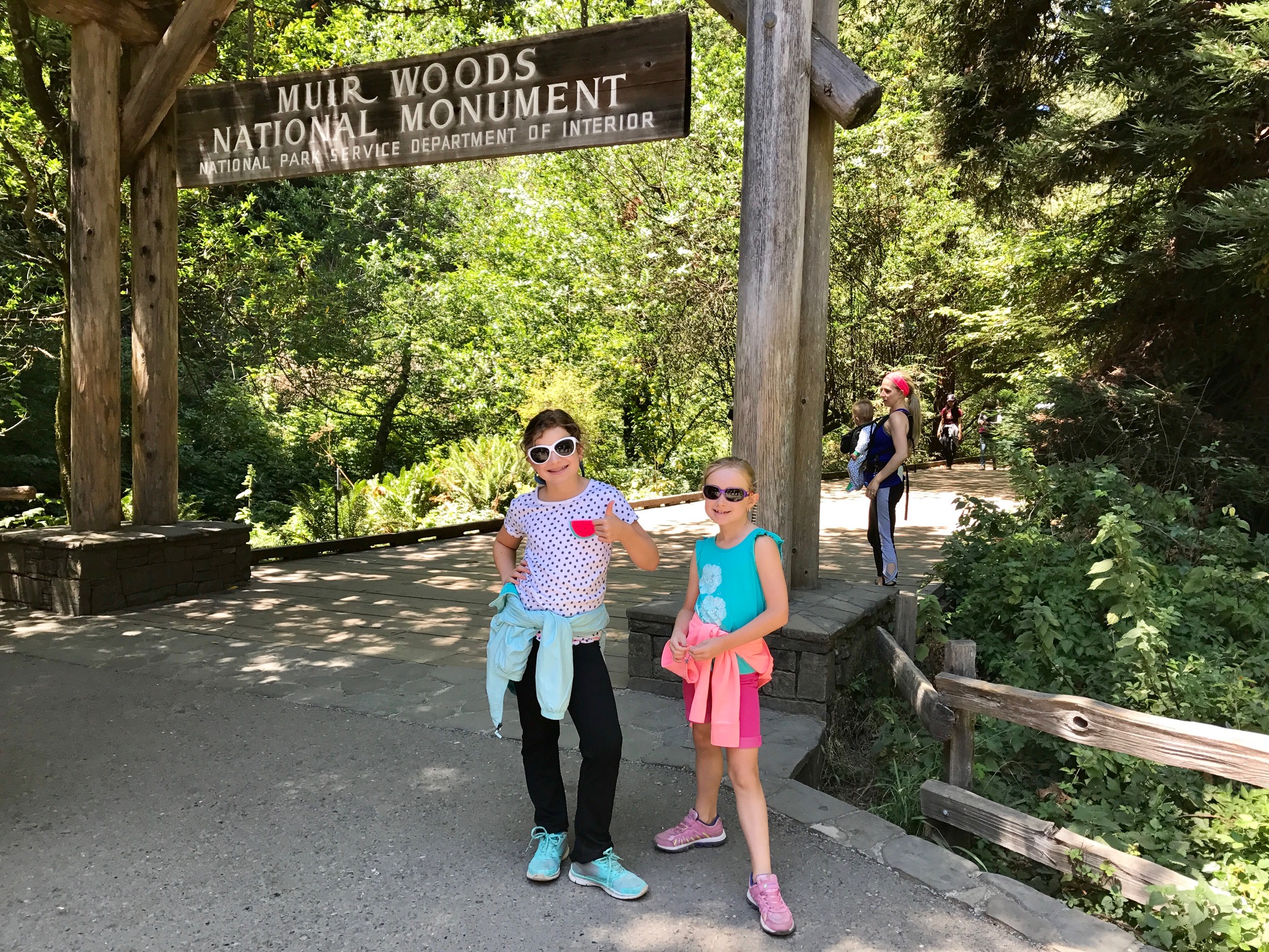 Kids at the entrance of Muir Woods National Monument