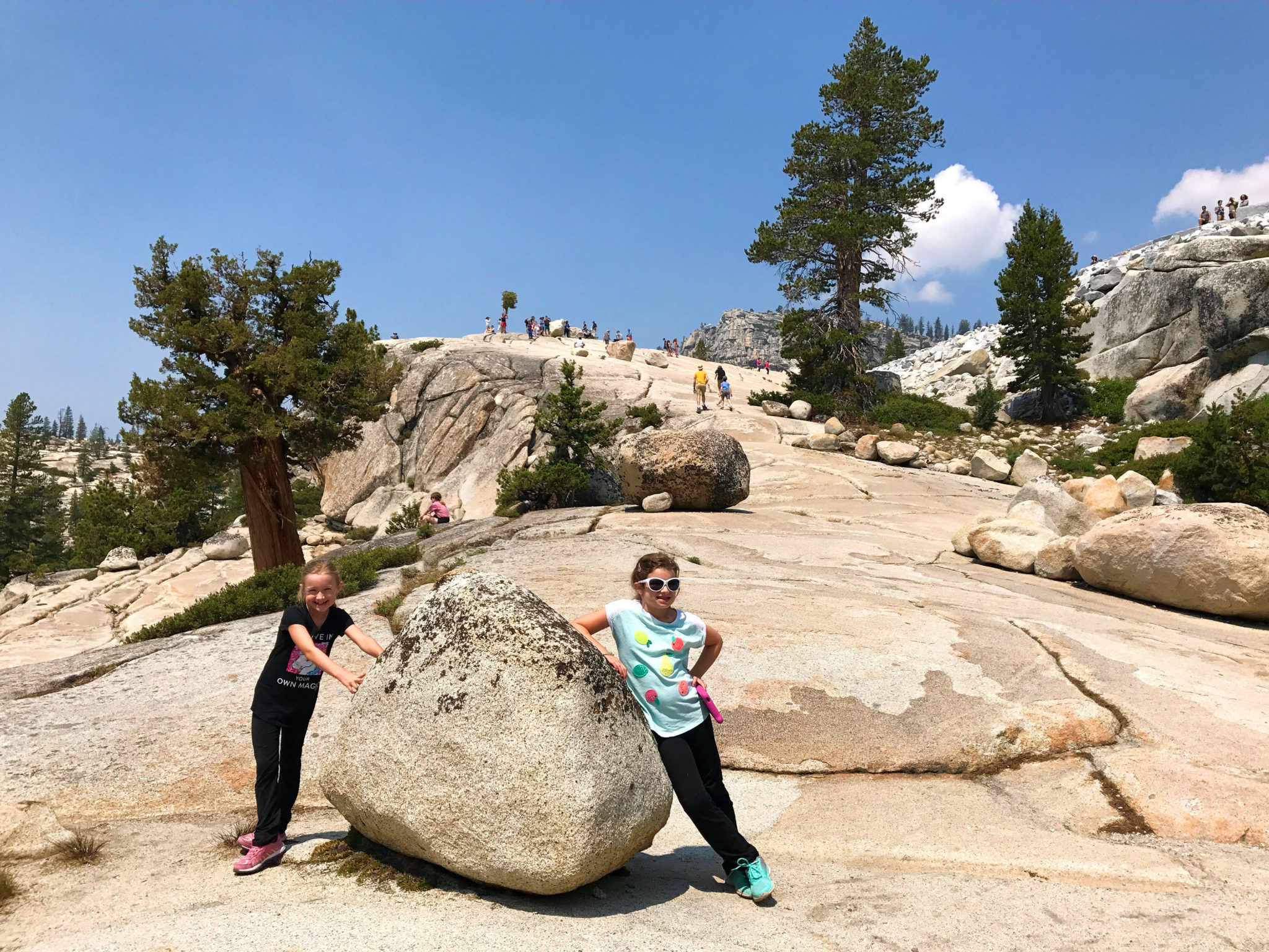 Our daughters on the granite at Olmsted Point near Tioga Road