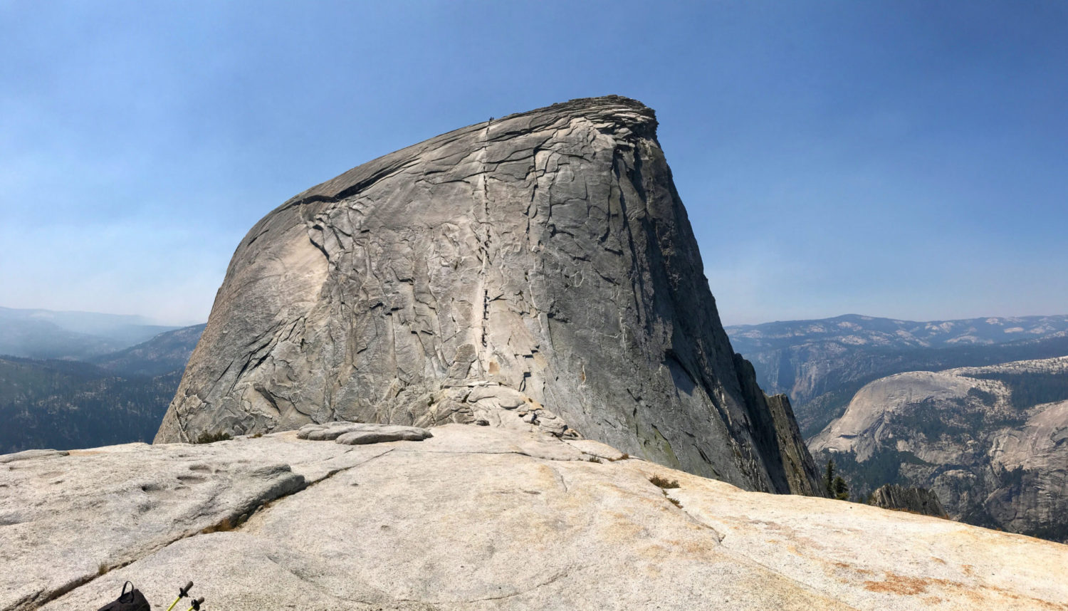 Half Dome and the cables as seen from the top of the subdome