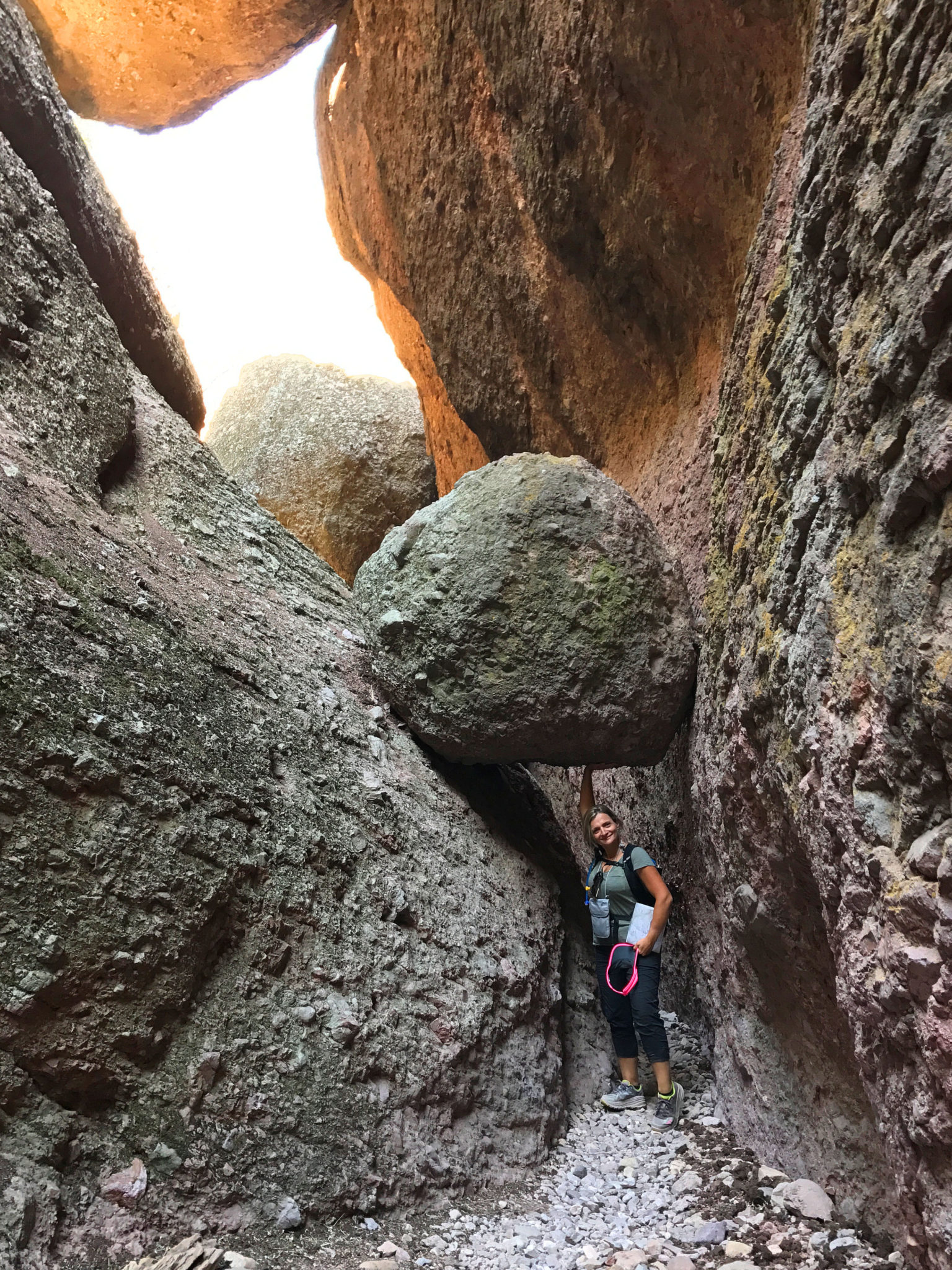 About to pass under a large rock near Balconies Cave