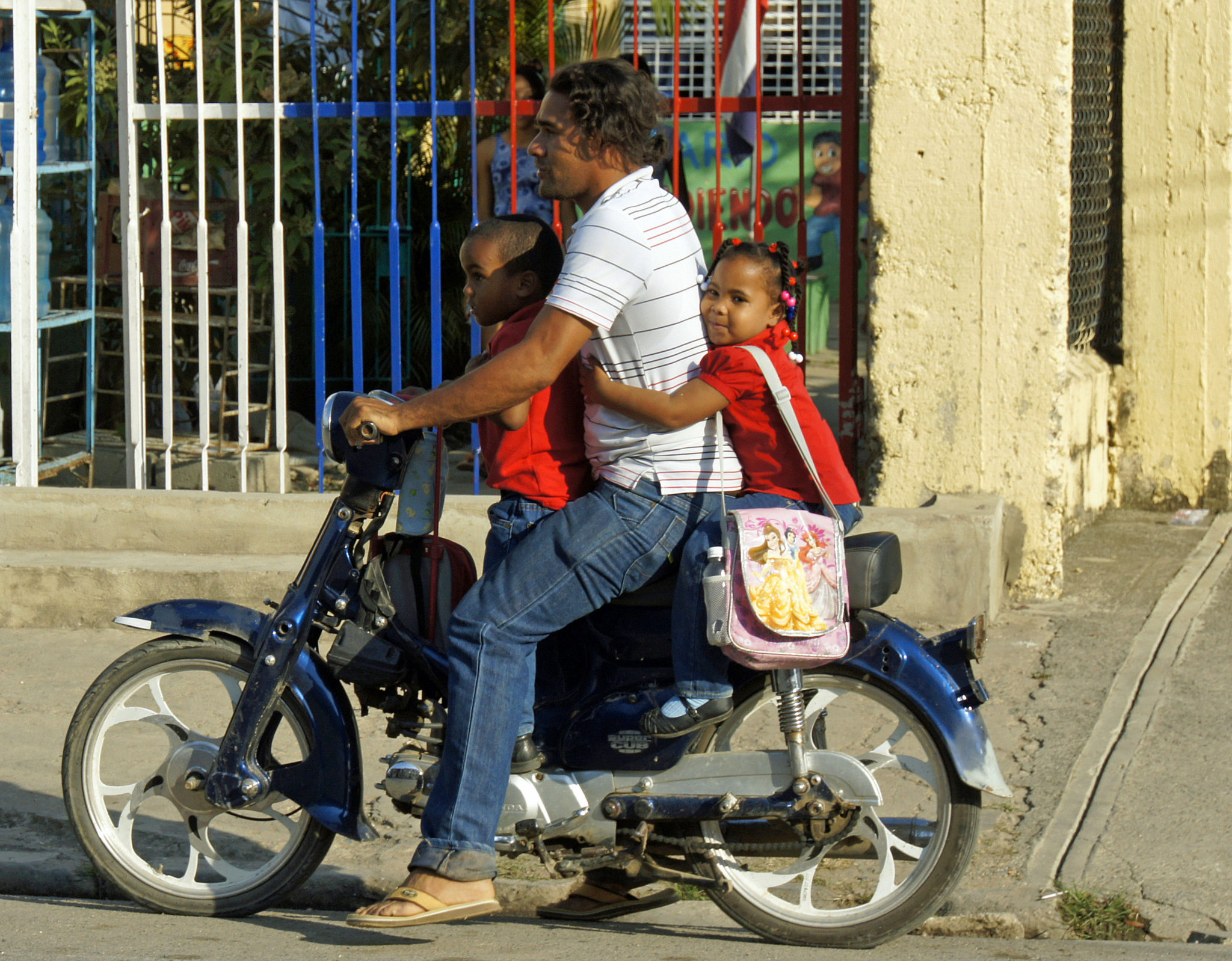 A family on a motorcycle in the Dominican Republic