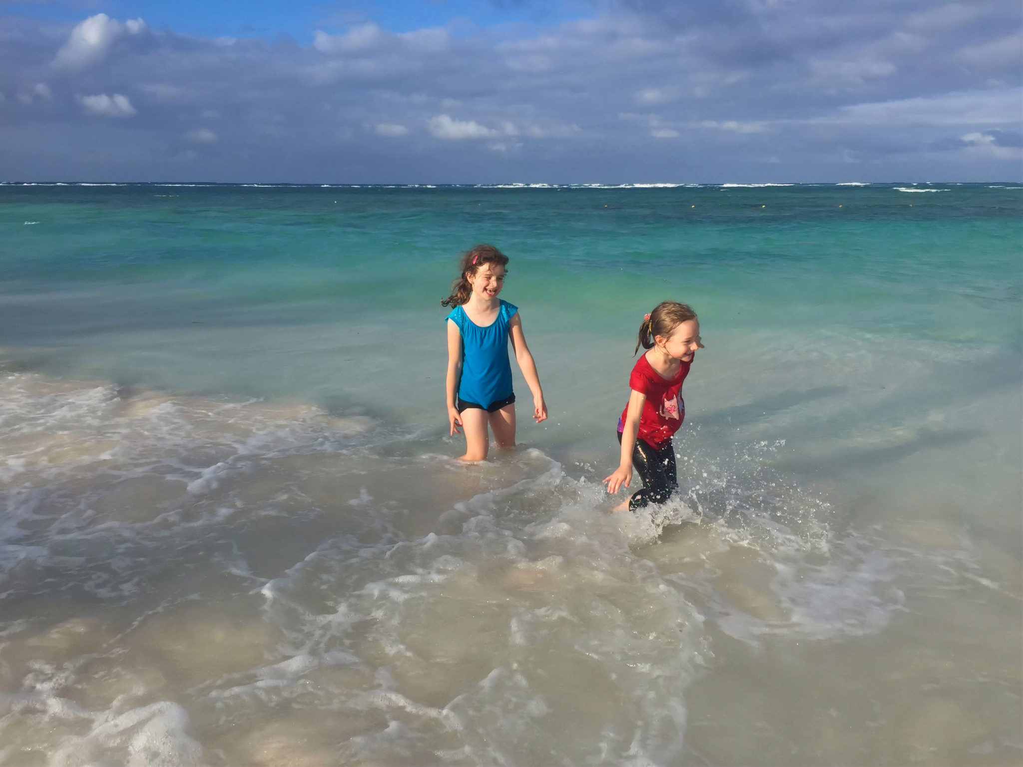 Kids splashing in the Caribbean Sea