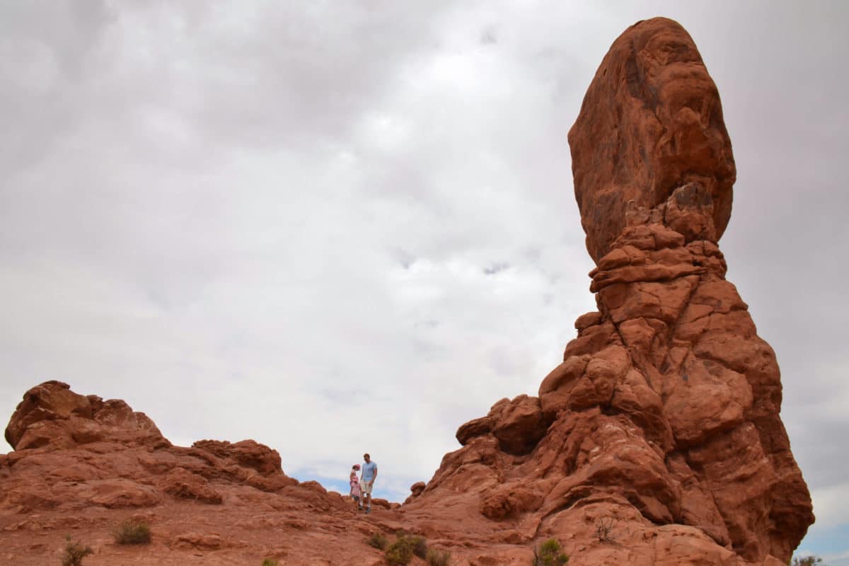 Standing near Balanced Rock in Arches National Park