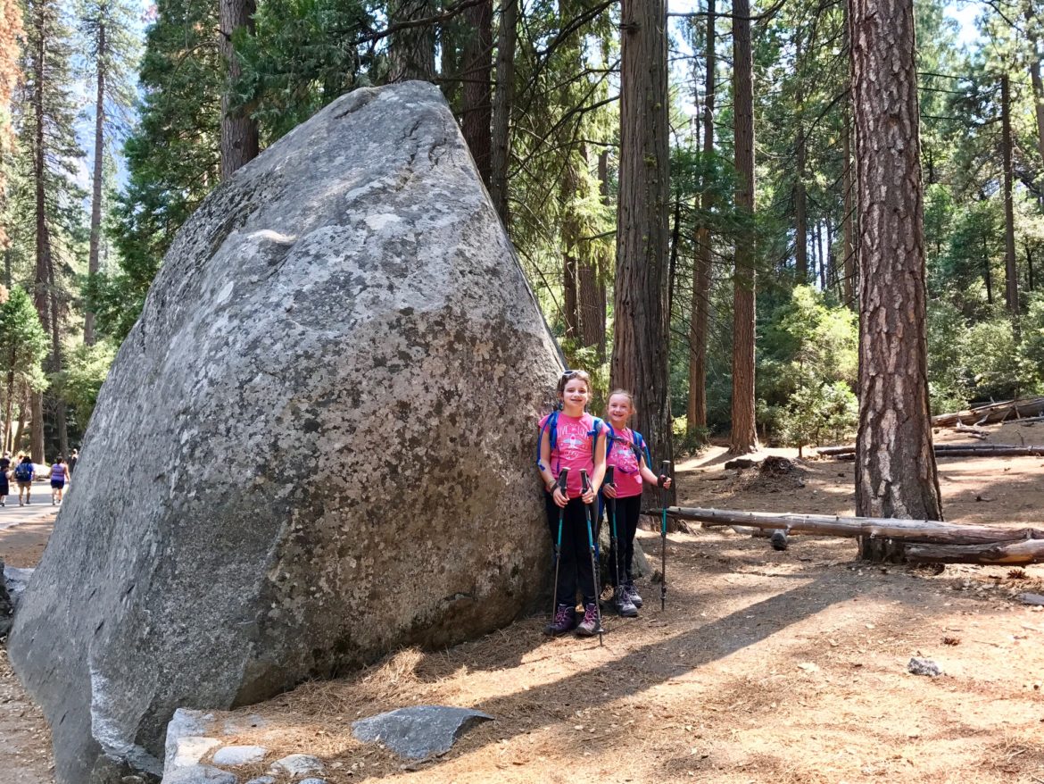 Standing near a rock on Lower Yosemite Falls Trail