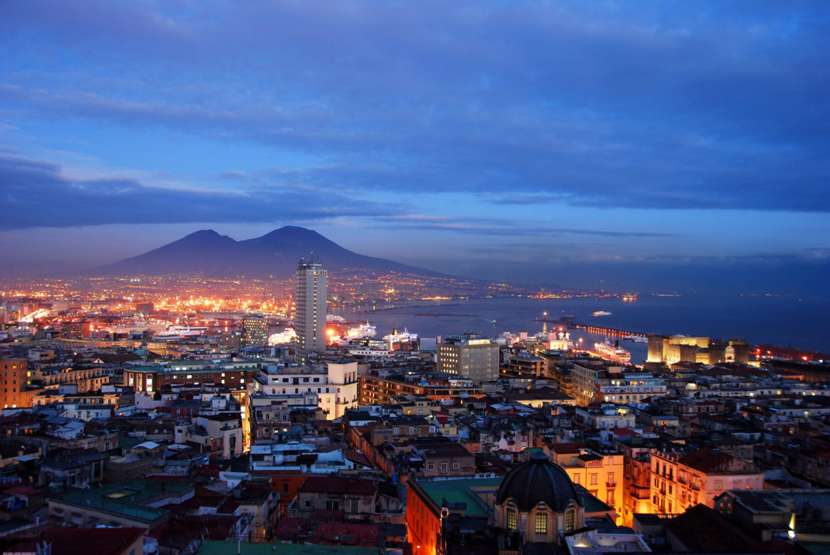 Naples, Italy after sunset with Mount Vesuvius