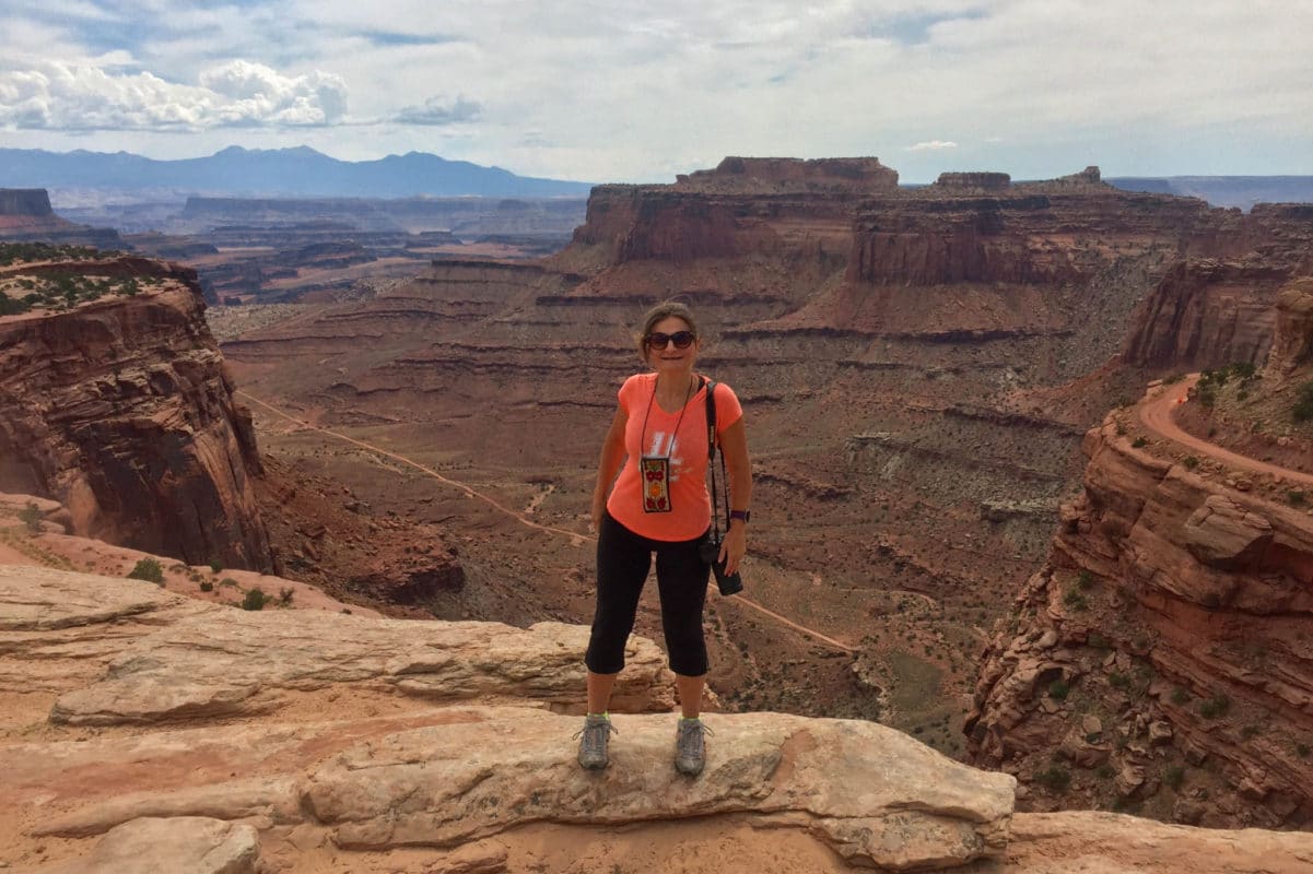 Posing with the view across Canyonlands Visitor Center