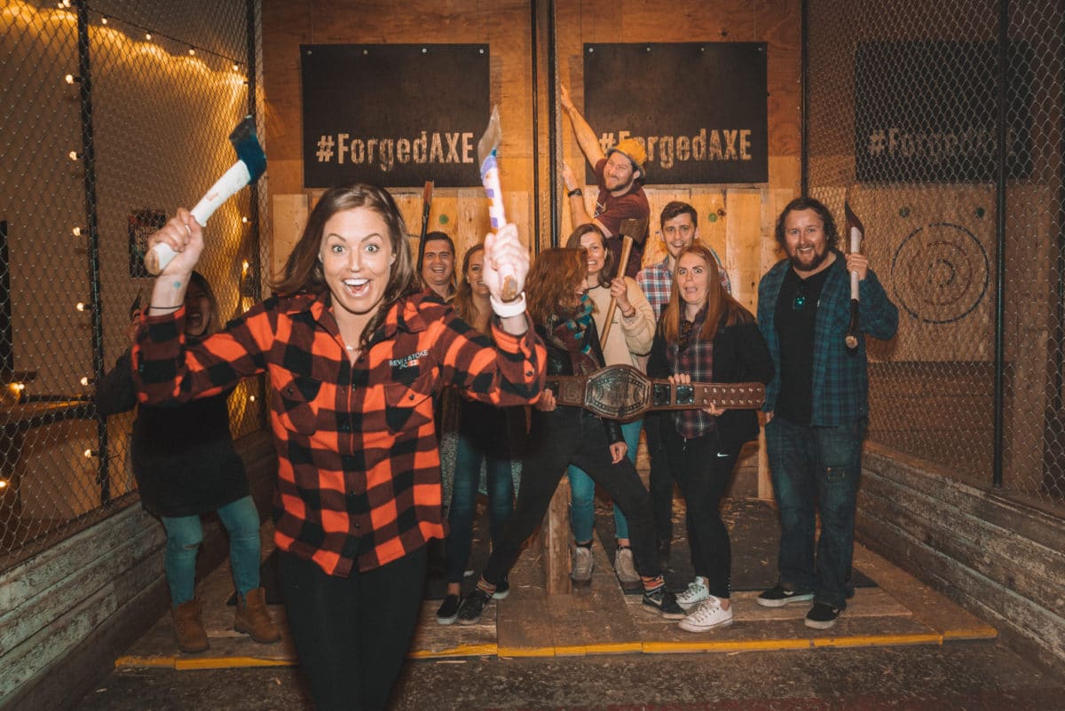 A group of people having fun at Forged Axe Throwing