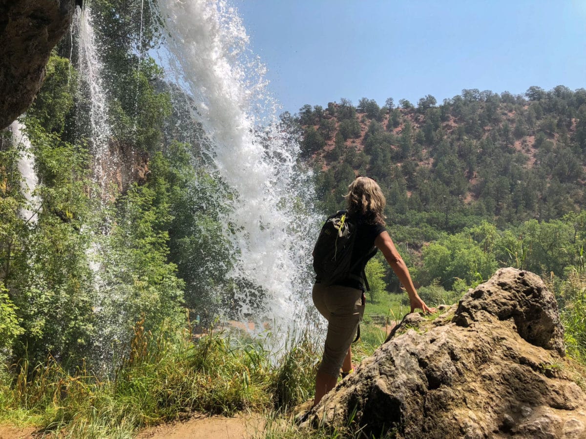 Standing behind Rifle Falls in Colorado