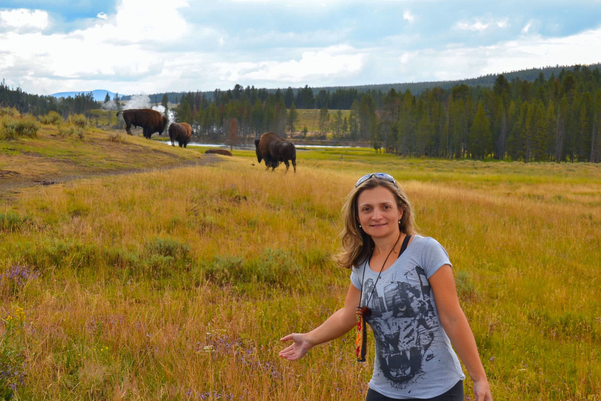 Posing with bison in Yellowstone