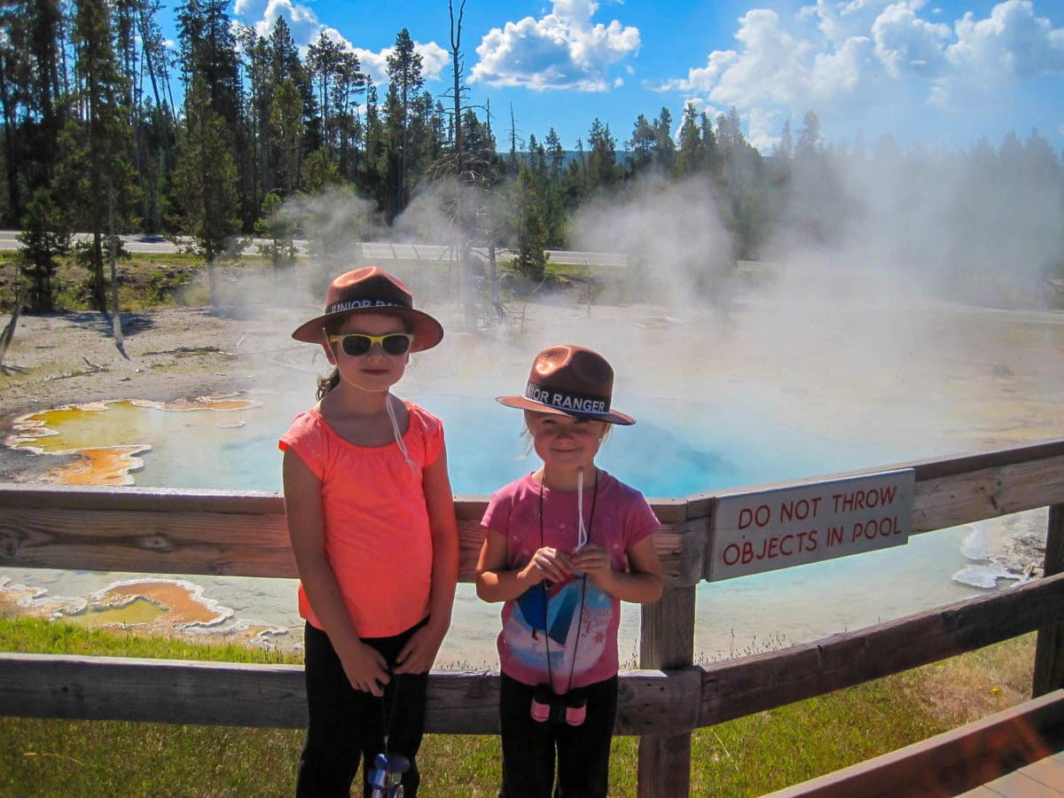 Posing with Silex Spring in Yellowstone