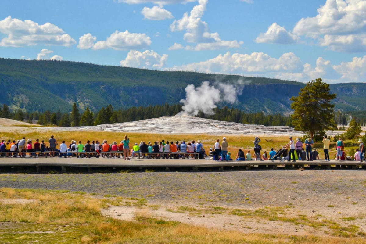 People waiting around Old Faithful in Upper Geyser Basin, Yellowstone