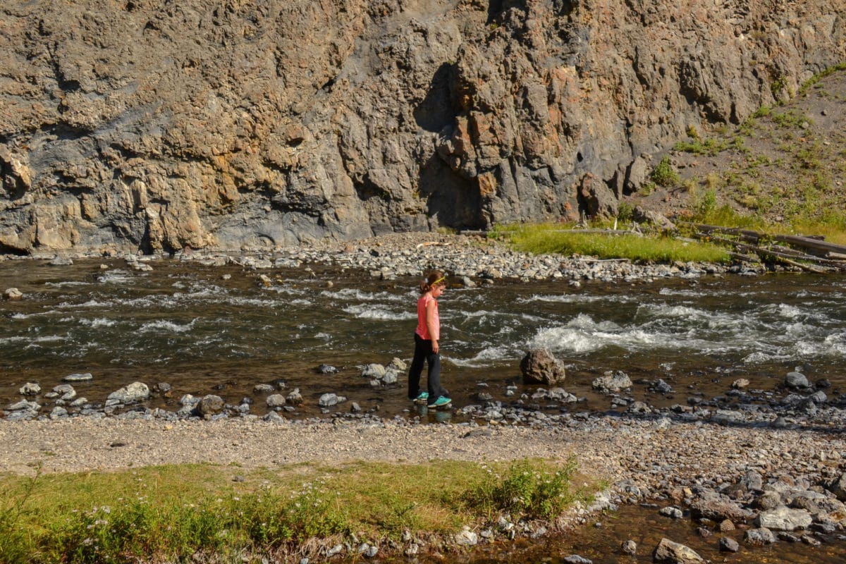 Walking on stones in the Firehole River