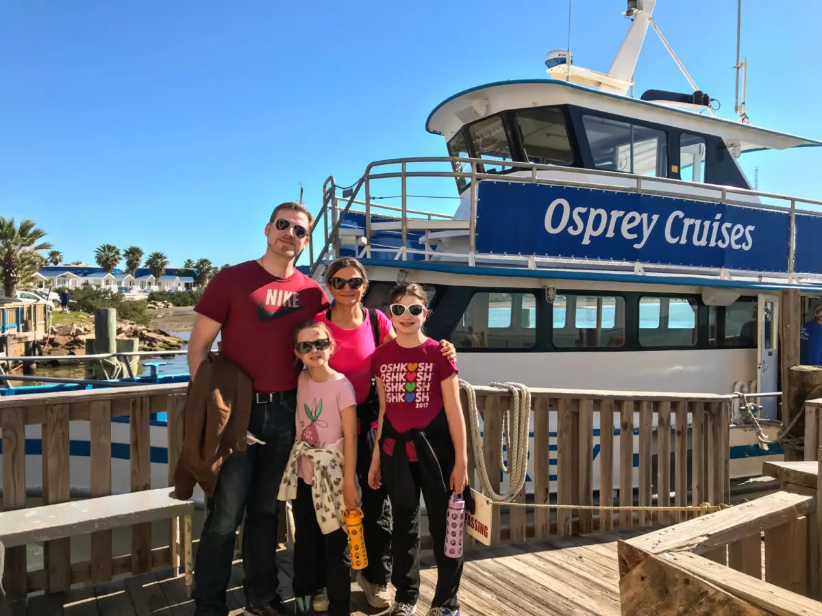 In front of Osprey Cruises boat