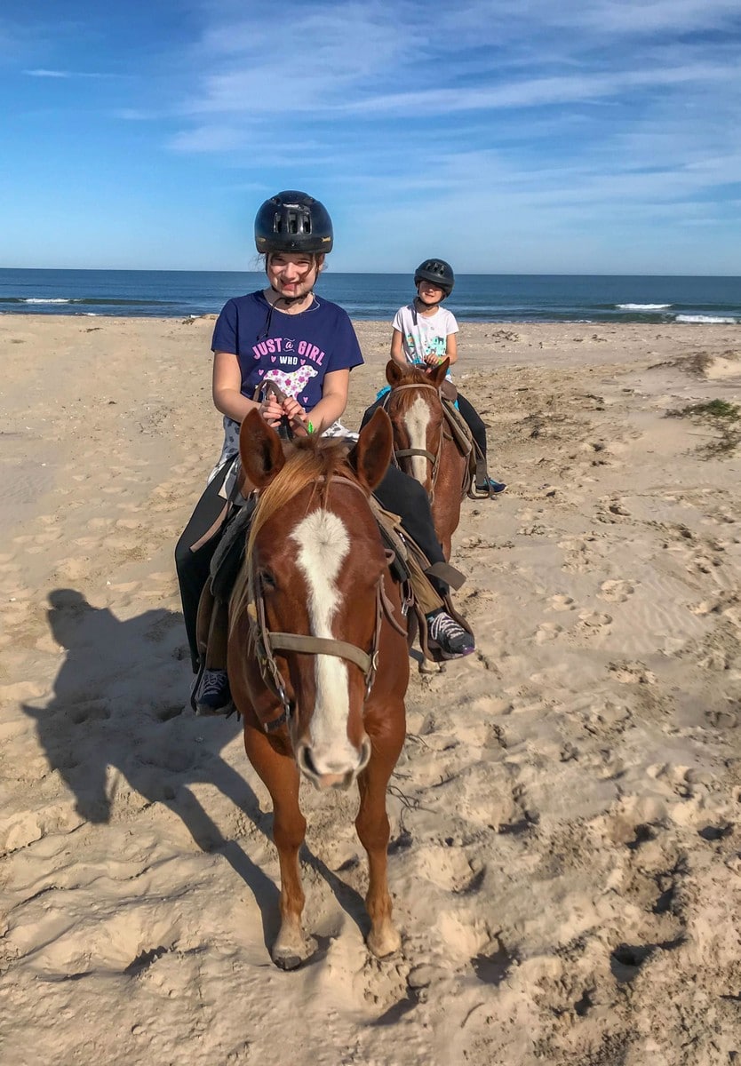 Returning from a horse ride on the beach in South Padre Island
