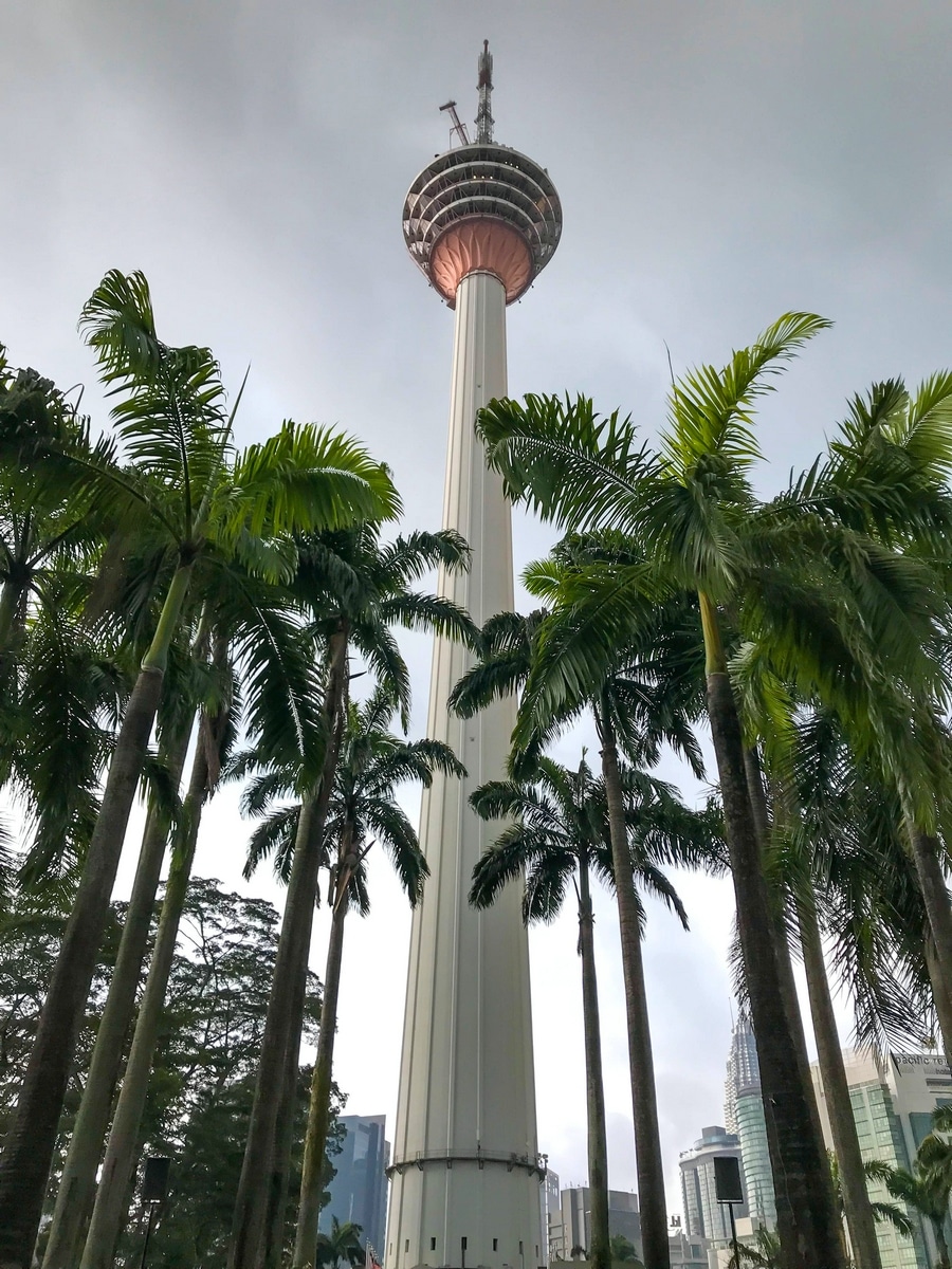 Looking up at the KL Tower on a cloudy day