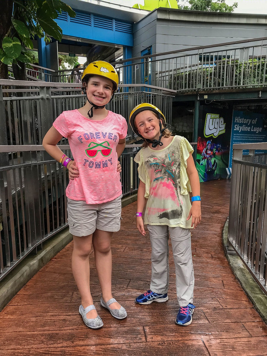 The kids excited to go on the luge in Sentosa