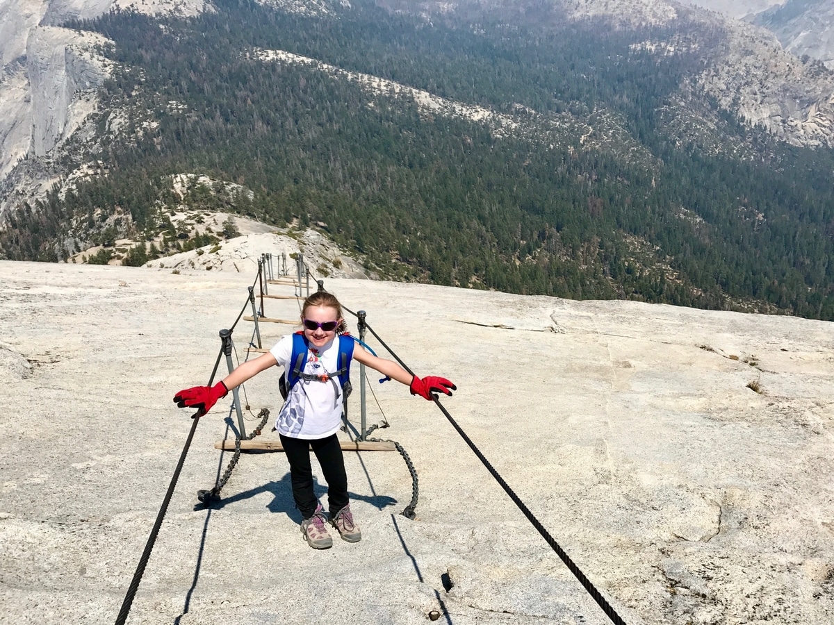 Posing at the top of the Half Dome Cables