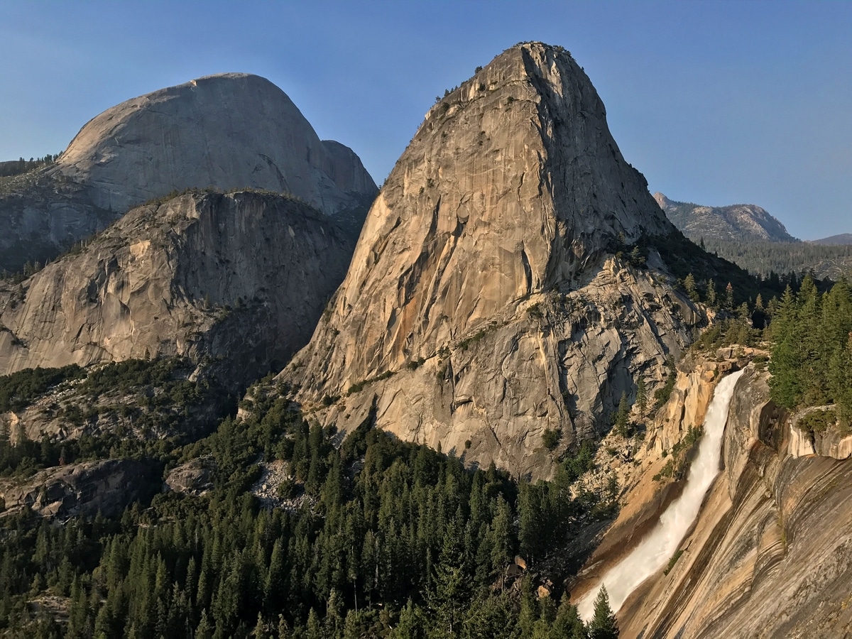 Half Dome from the back, Liberty Cap and Nevada Fall at sunset as seen from the John Muir trail