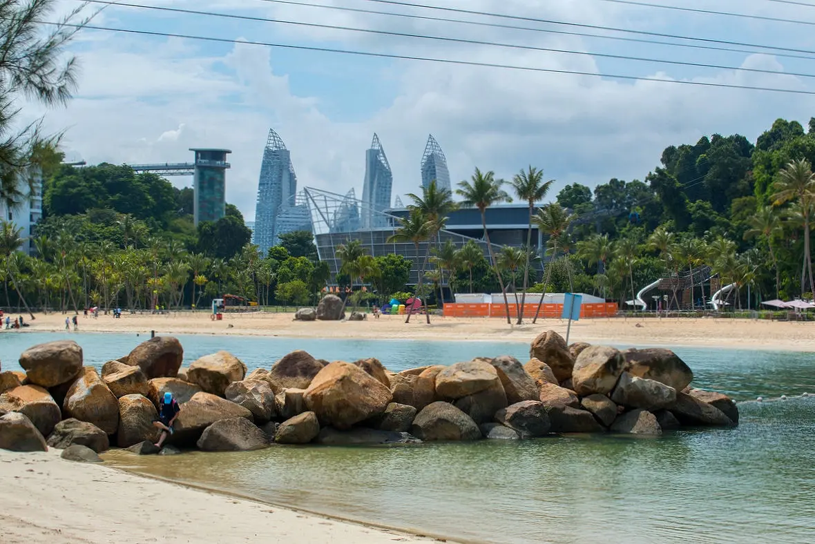 Beautiful view of Siloso Beach and the modern Singapore skyline behind