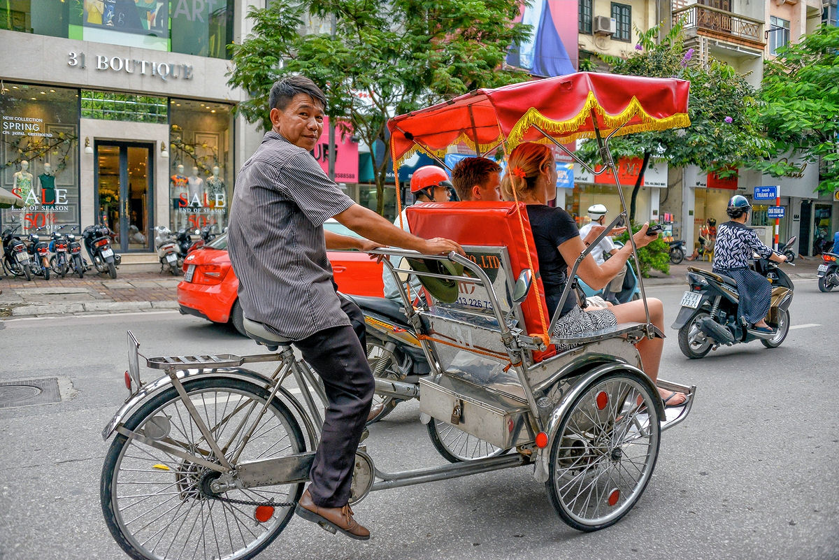 Cyclo driver on a street in Hanoi