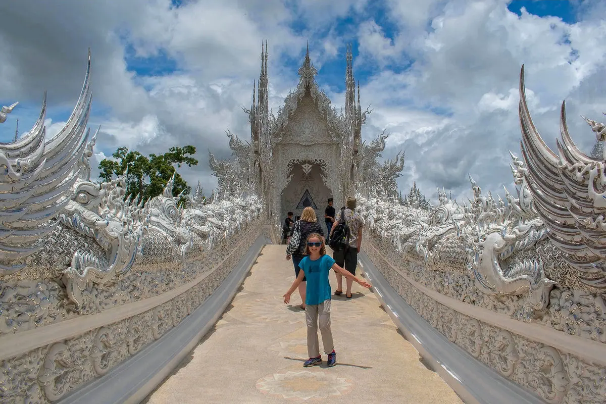 Posing on the Bridge of the Cycle of Rebirth at the White Temple