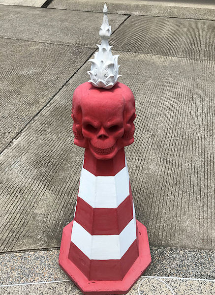 Funky road cone at the White Temple in Thailand