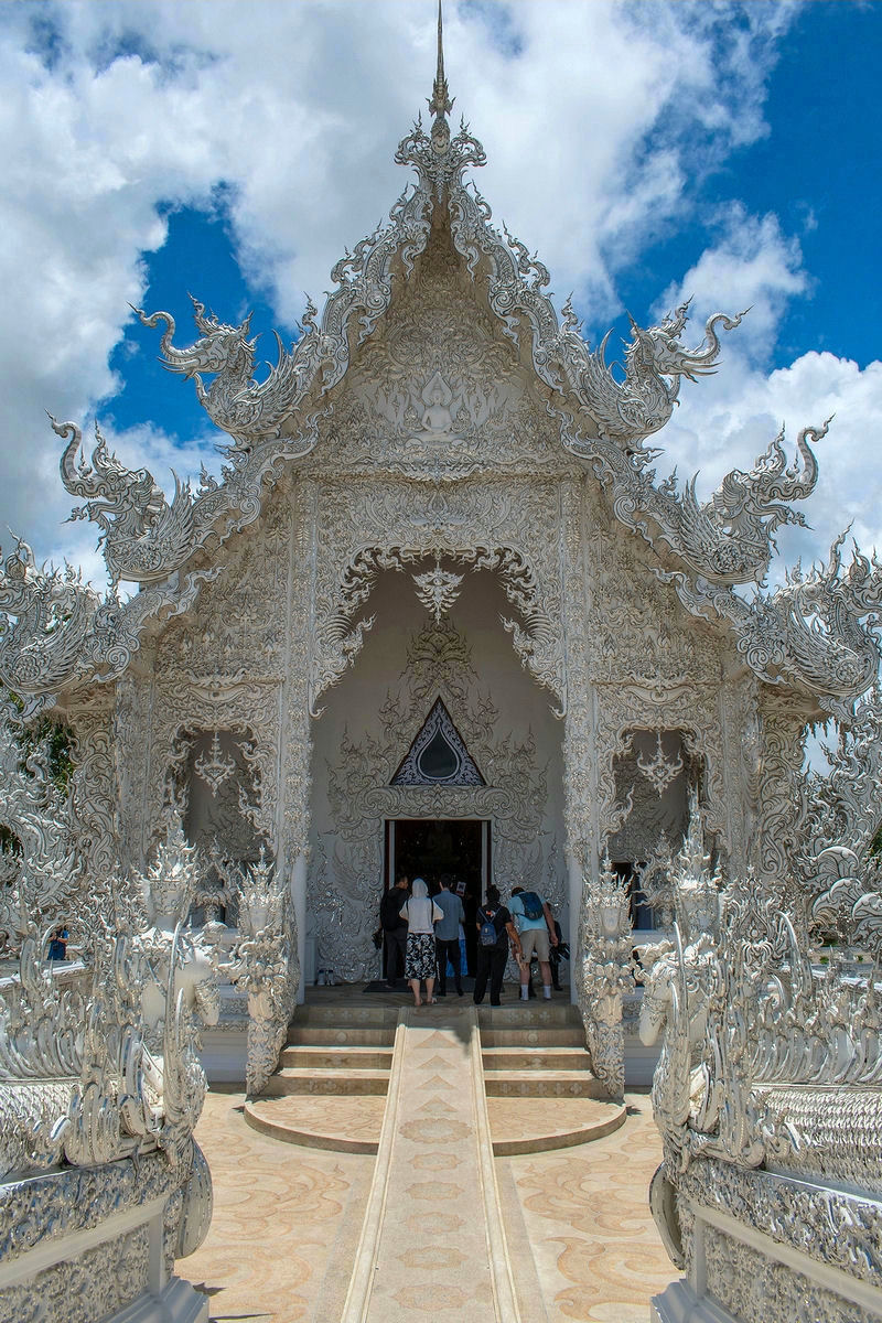 The ornate entrance of the White Temple in Thailand