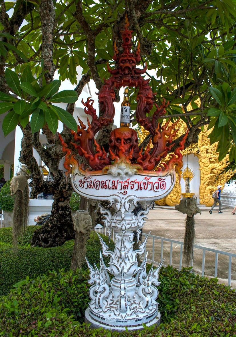 Whisky sculpture at the White Temple in Thailand