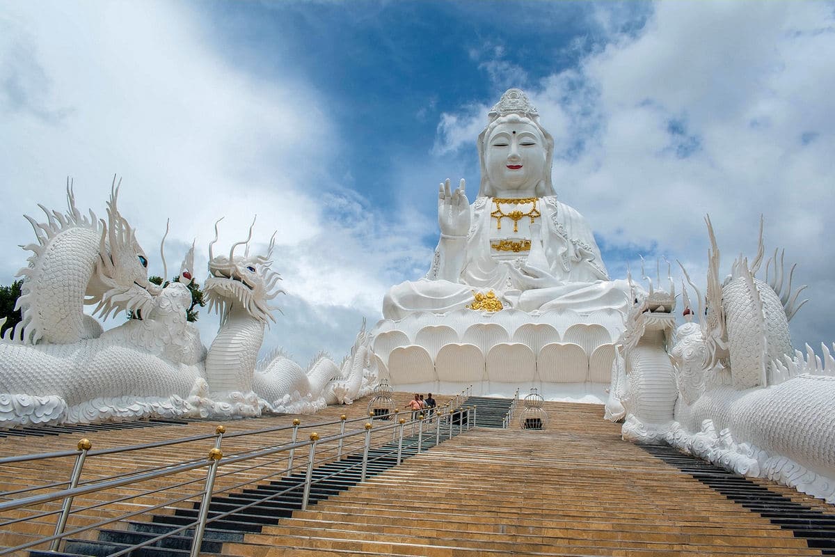 Climbing towards giant Guanyin statue at Wat Huai Pla Kang in Chiang Rai