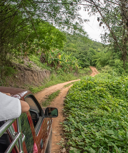Driving on dirt road to Karen Elephant Serenity, Thailand