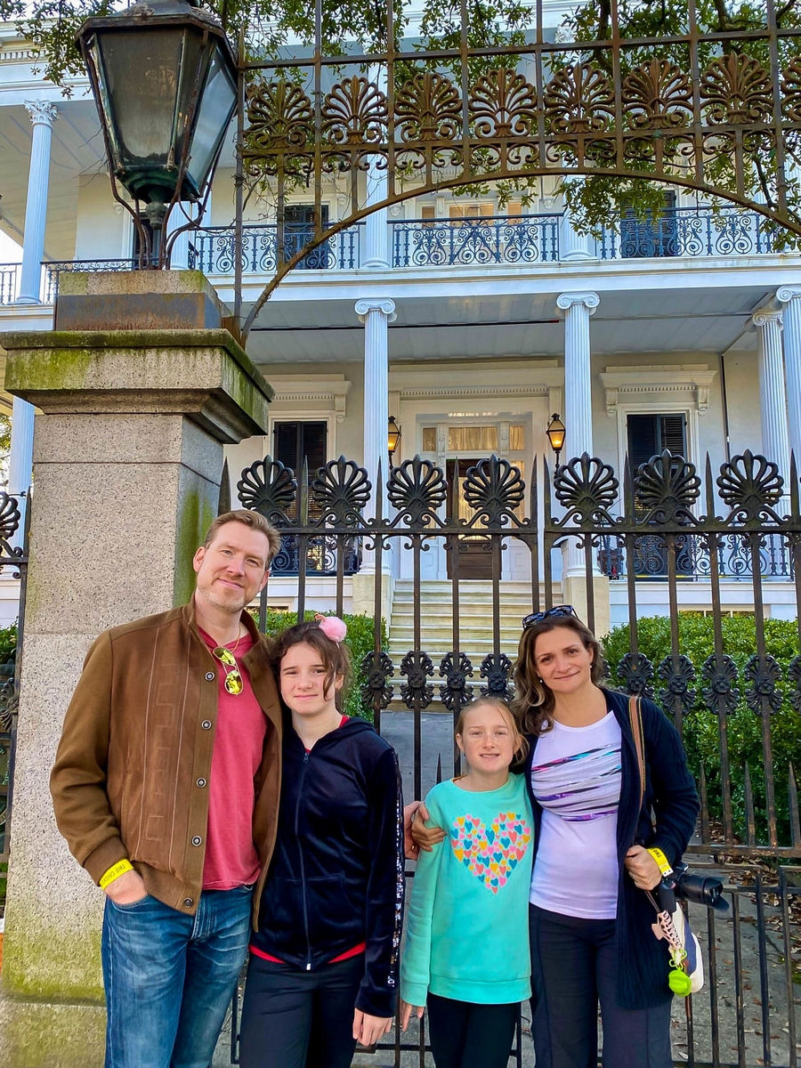 Family photo in front of the "American Horror Story: Coven" mansion
