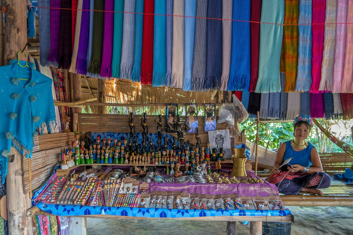 Karen Long Neck woman selling crafts