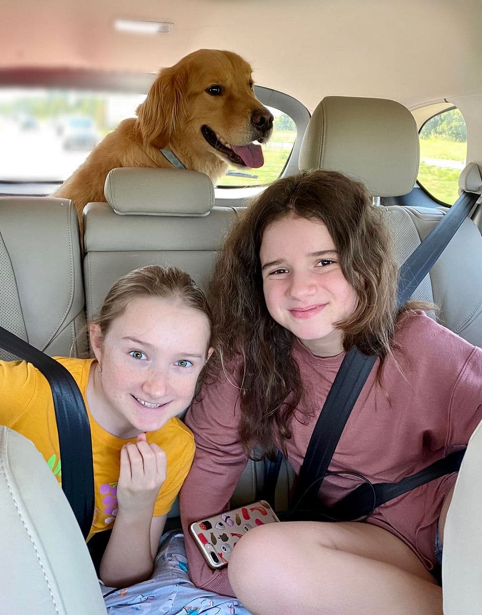 Kids and dog in the car on the way to Plano