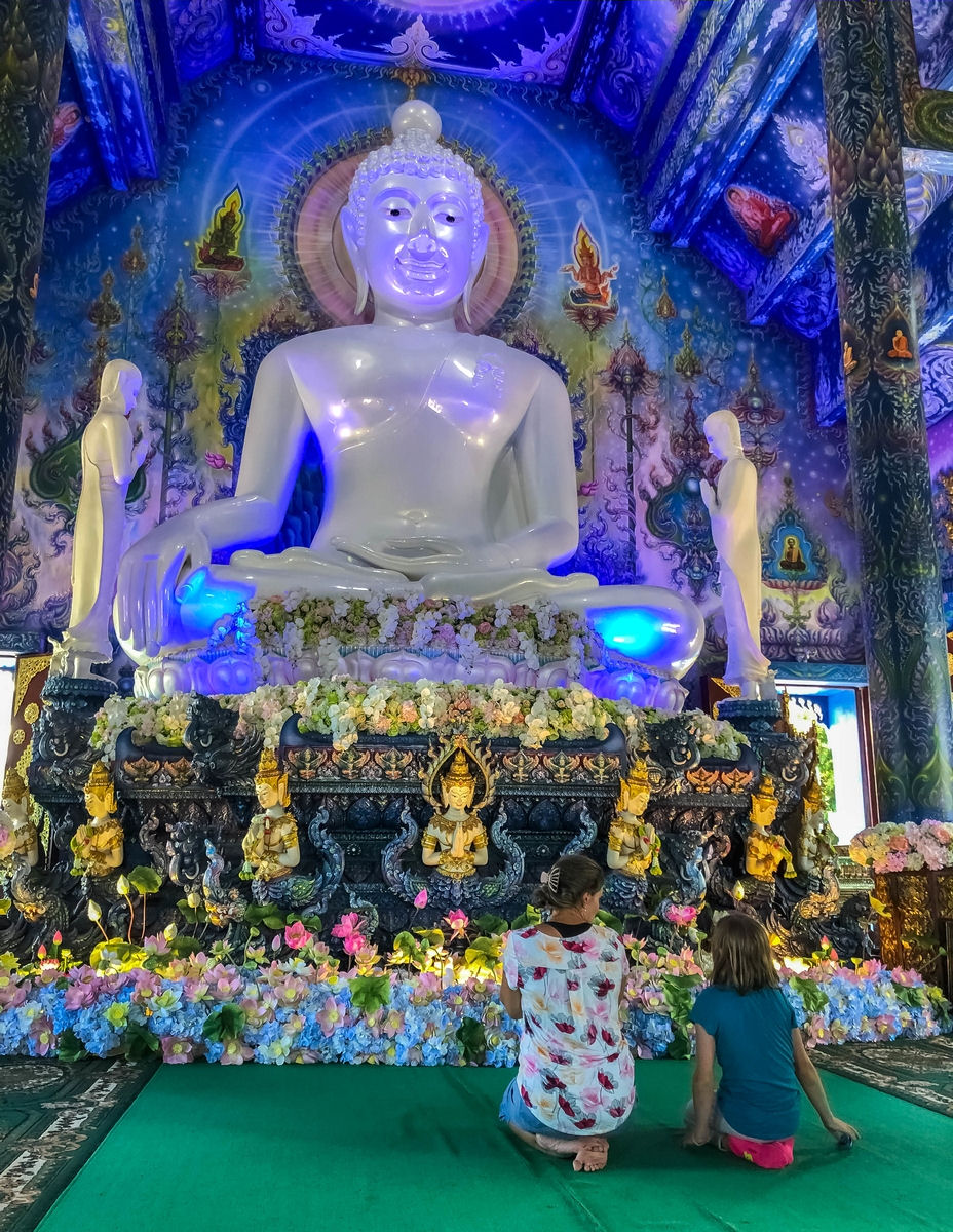 Large Buddha statue inside The Blue Temple in Chiang Rai, Thailand
